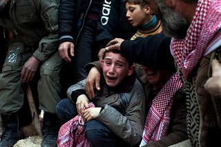 Illustration for article titled The 2013 Pulitzer Prize-Winning Images of the Syrian Civil War